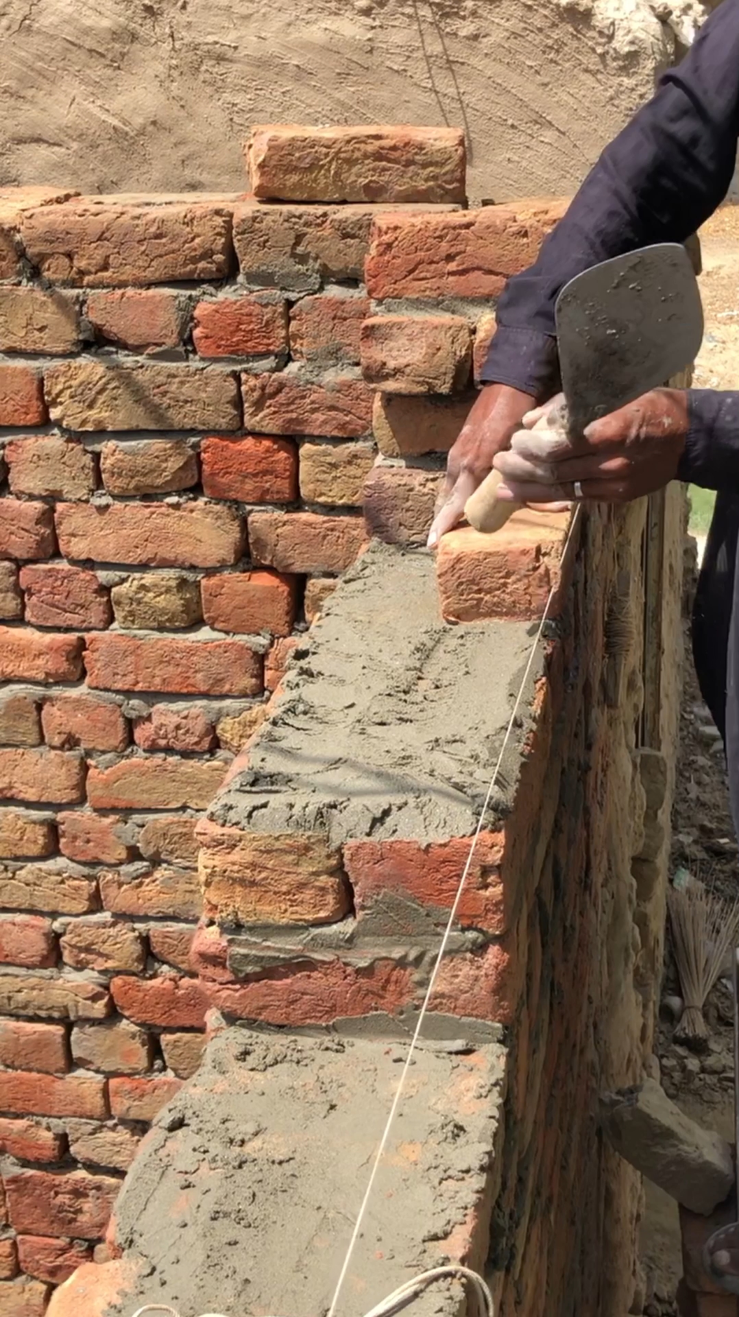 Tell me why this wall is being built like this.