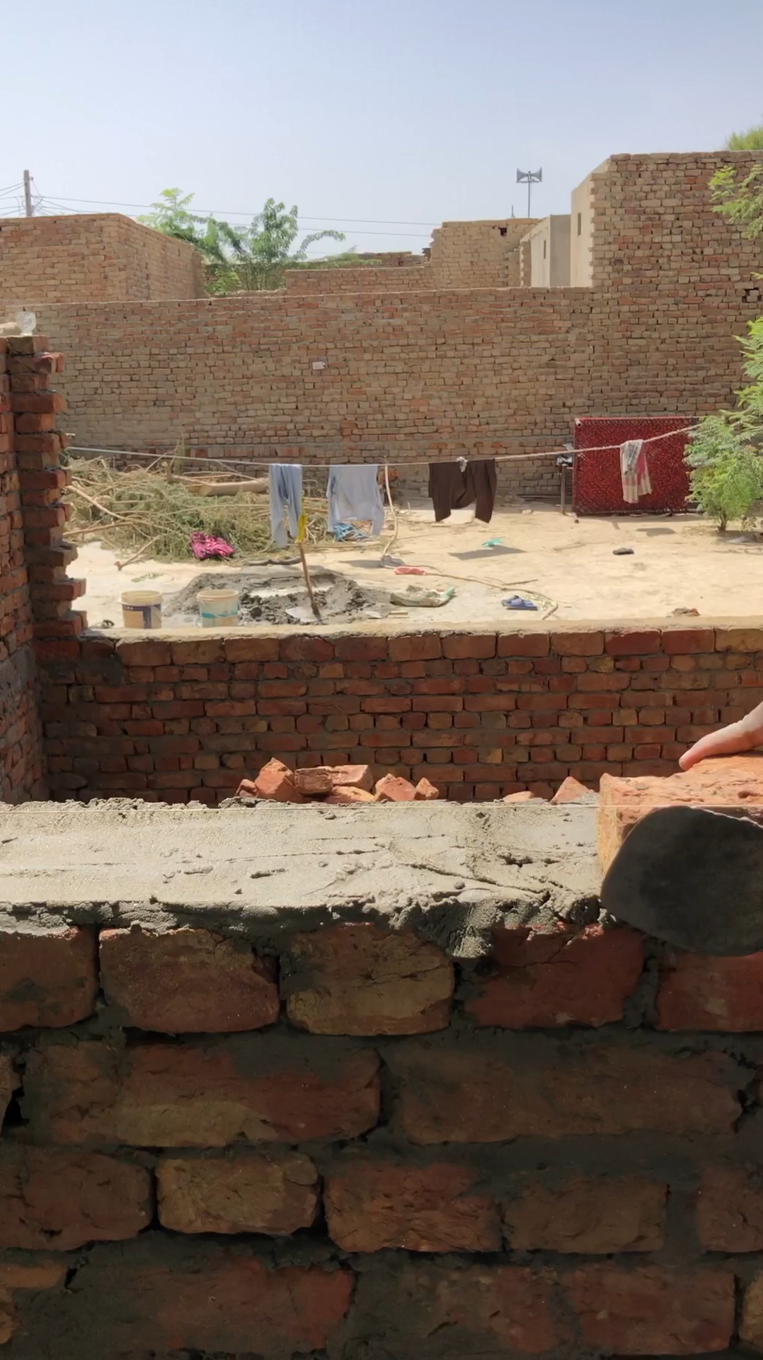 Brick wall around the door.