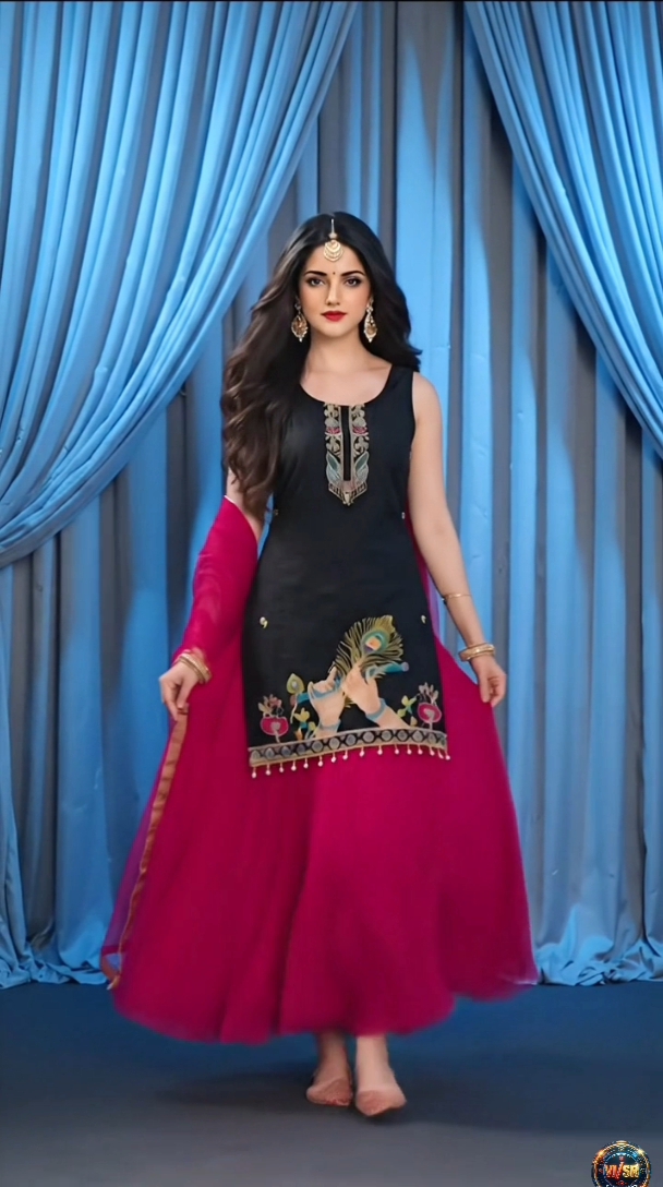 Women in silk pink palazzo and black kurti